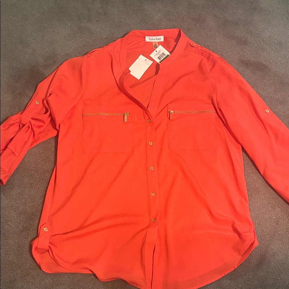 Calvin Klein Vibrant Coral Blouse with Gold Accents